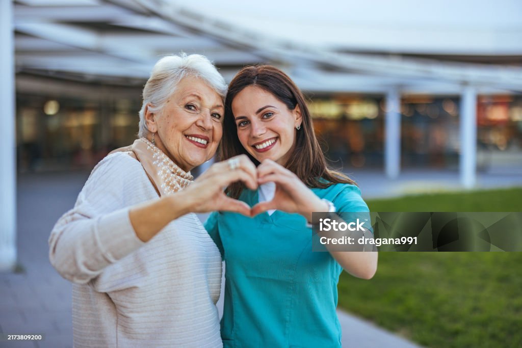 Elderly patient and her nurse